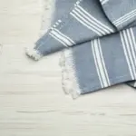 Proč mají kvalitní ručníky na okrajích pruhy: Nejde o design, ale o životnost